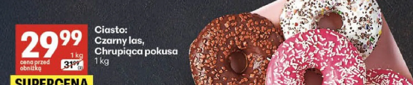 Donut o smaku truskawkowym, czekoladowym, z białą posypką promocja w Delikatesy Centrum