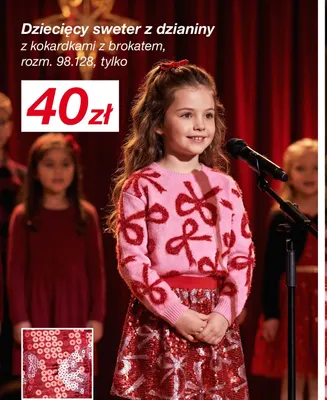 Dziecięcy sweter z dzianiny z kokardkami z brokatem promocja w KiK