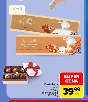 Czekolada Lindt Swiss Premium Chocolate mleczna z orzechami laskowymi promocja w Carrefour