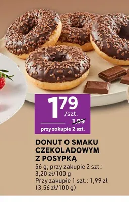 Donut o smaku czekoladowym z posypką promocja w Stokrotka