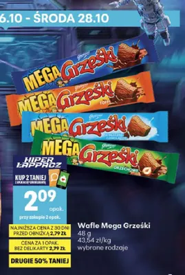 Wafle Mega Grześki w czekoladzie mlecznej promocja w Delikatesy Centrum