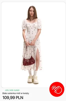 Biała sukienka midi w kwiaty Cropp promocja w Cropp