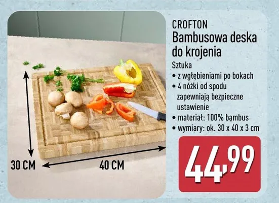 Bambusowa deska do krojenia 2 wgłębieniami po bokach, 4 nóżki od spodu zapewniają bezpieczne ustawienie, materiał: 100% bambus, wymiary: ok. 30 x 40 x 3 cm promocja w Aldi